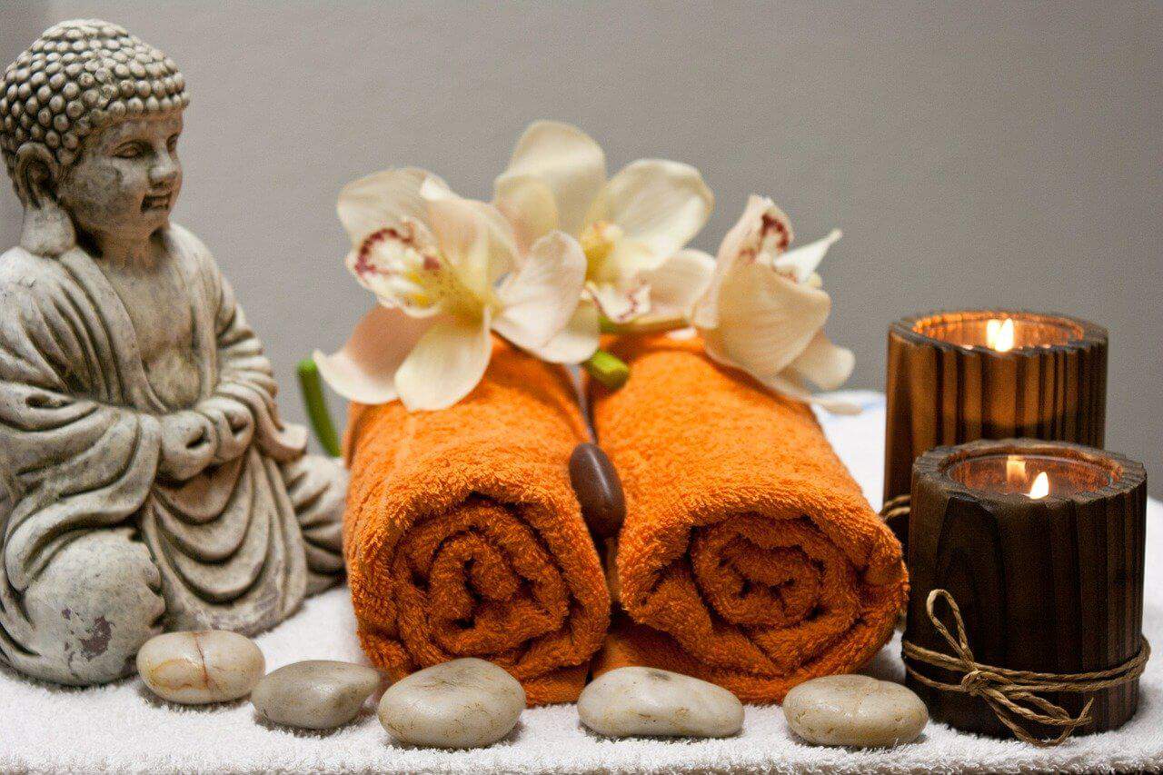 flowers, towels, and candles to creating a calming massage atmosphere