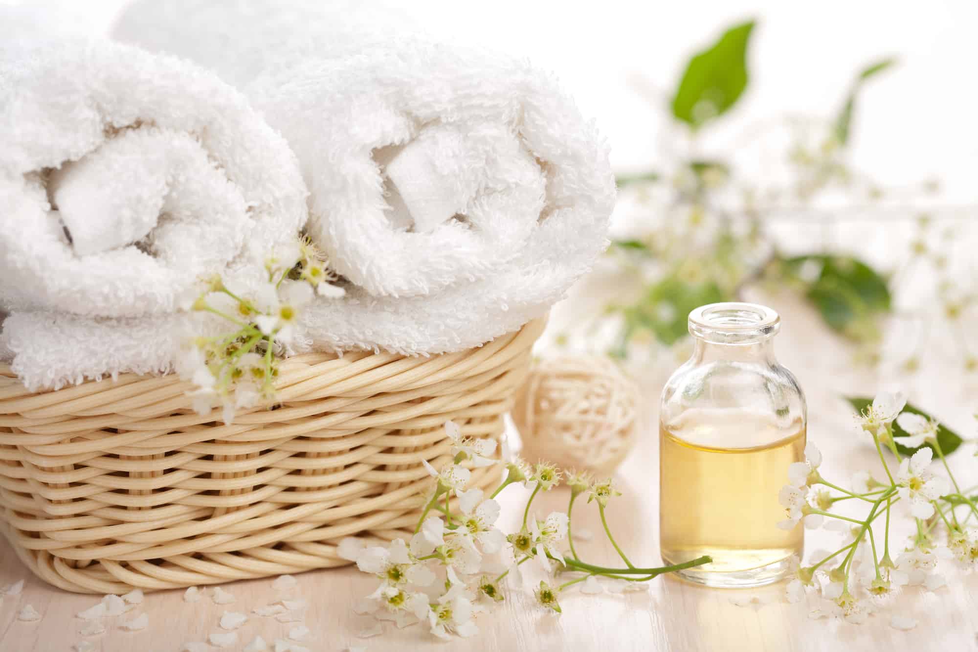 essential oils and towels for the shower