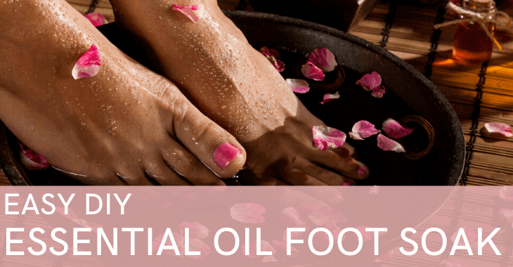 feet in a bath with flowers with text overay "Easy DIY Essential Oil Foot Soak"