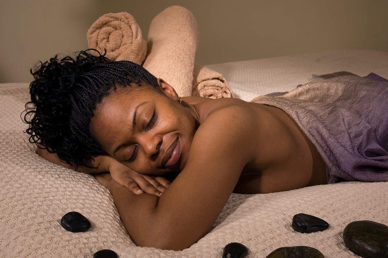 woman feeling relaxed after massage treatment